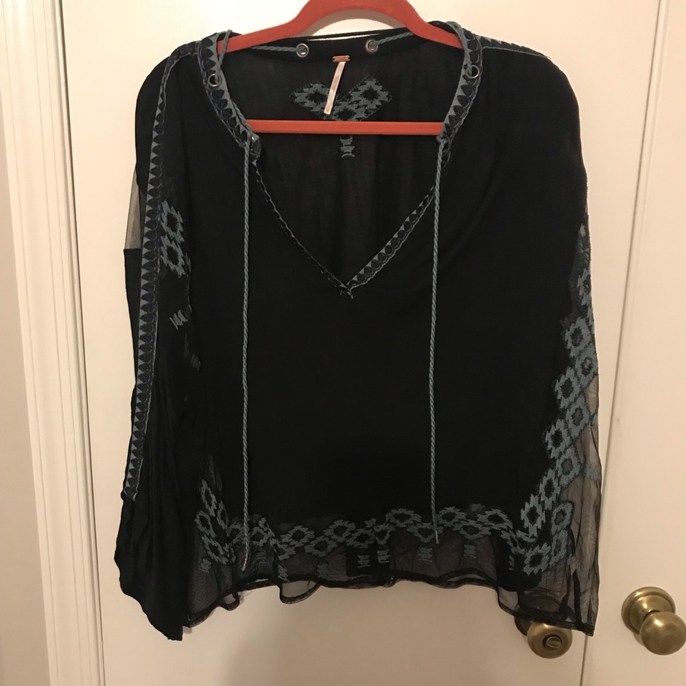 Beautiful free people embroidered blouse.
